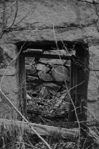 Old abandoned house on field