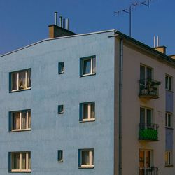 Residential building against blue sky