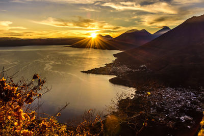 Scenic view of mountains against sky during sunset