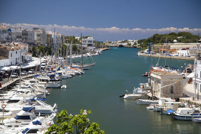 High angle view of harbor and buildings in city