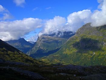 View of mountain range against cloudy sky