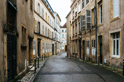 Narrow alley along buildings