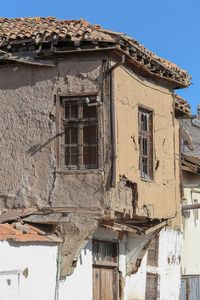 Low angle view of old building against sky