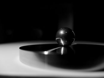 Close-up of crystal ball on table