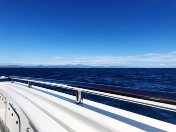 Scenic view of sea against blue sky