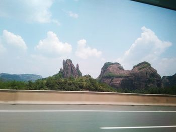 View of road passing through mountains