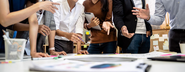 Group of people working on table