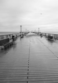 Empty boardwalk pier on a rainy day