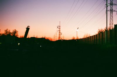 Silhouette of city against clear sky