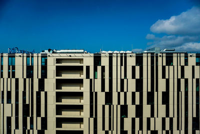 Low angle view of building against blue sky