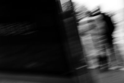 Blurred motion of building in city