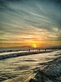 Scenic view of sea at sunset