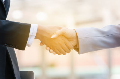 Close-up of hand holding ice cream