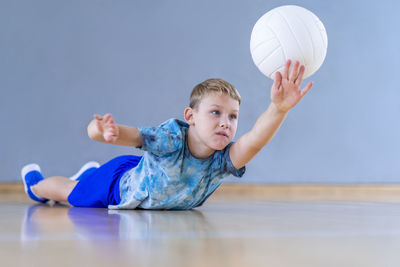 Boy playing with ball