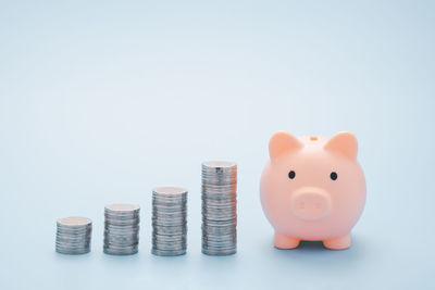 Stack of coins on white background