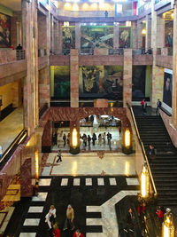 High angle view of people at illuminated steps