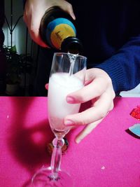 Close-up of woman holding drink