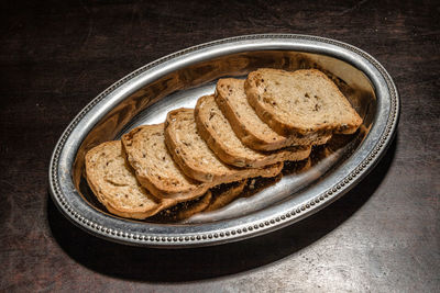 High angle view slices of bread on tray
