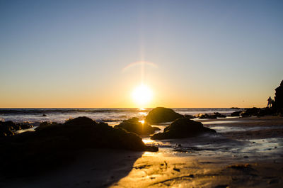 Scenic view of sea during sunset