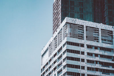 Low angle view of modern building against clear sky