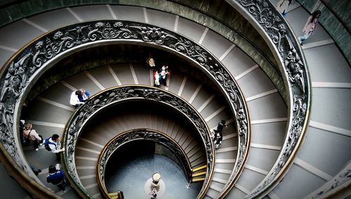 High angle view of people on spiral staircase