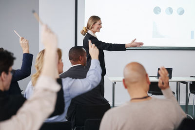 Woman having presentation during business meeting