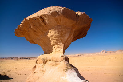 View of desert against clear sky