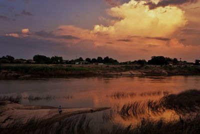 Scenic view of landscape against sky during sunset