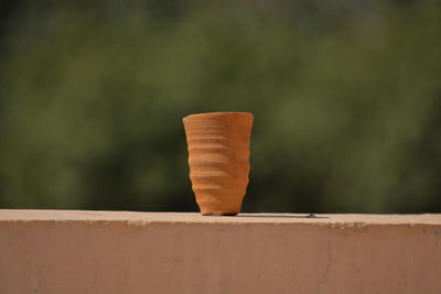 Cup made of mud sand called kulhad kullhad used to serve authentic indian drinks structure on wall
