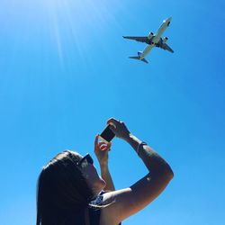 Woman plane spotting near madrid barajas airport