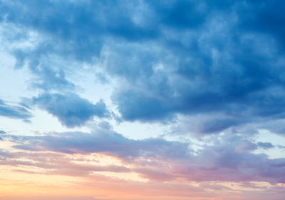 Low angle view of cloudy sky during sunset