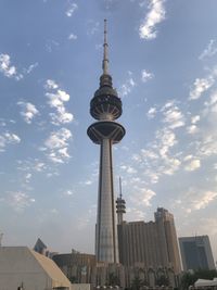 Low angle view of buildings in city against sky