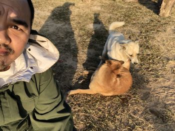 High angle view of man with dog