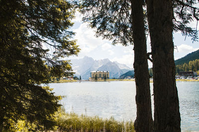 Scenic view of lake and mountains against sky