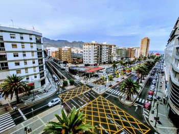 High angle view of street amidst buildings in city