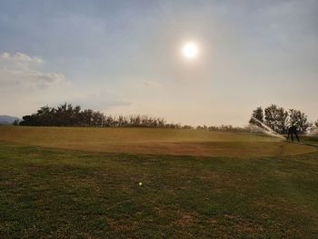 Scenic view of field against sky