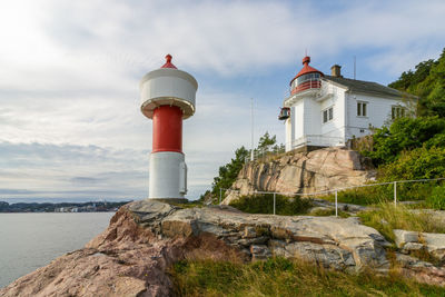 Low angle view of lighthouse against sky