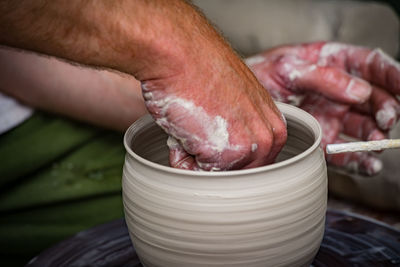 Close-up of man holding food