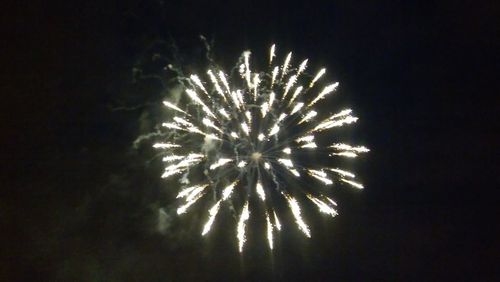 Firework display at night