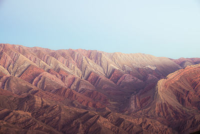 Aerial view of landscape with mountain range in background