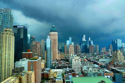 Modern buildings in city against sky
