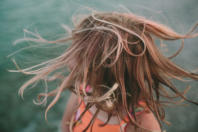 Close-up of windswept hair on a breezy day