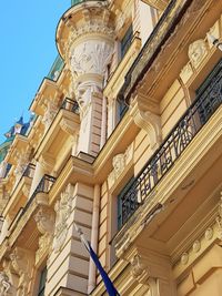 Low angle view of ornate building against sky