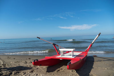 Rescue rowing catamaran on the sand