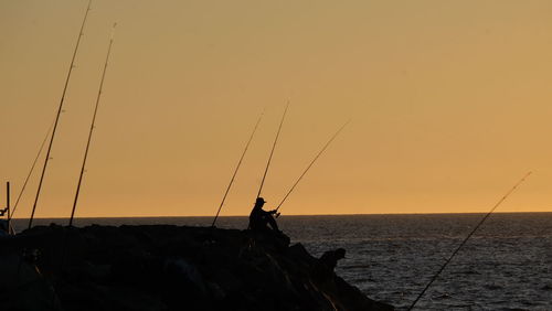 Scenic view of sea at sunset