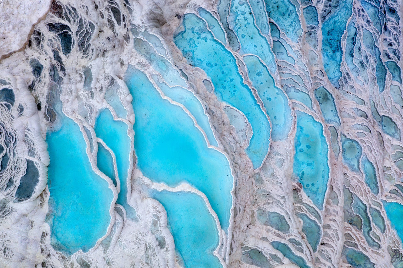 FULL FRAME SHOT OF FROZEN BLUE WALL