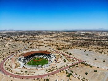 High angle view of landscape against blue sky