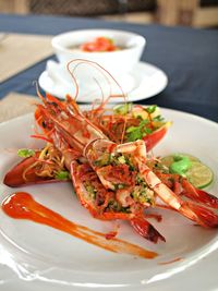 Close-up of shrimp served in plate on table