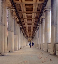 People walking in corridor