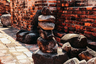 Stack of cross against wall